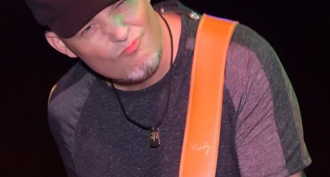 Jude Gold — Moody Leather luxury guitar strap artist