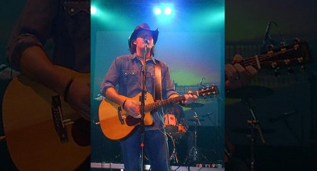 Rick Monroe — Moody Leather luxury guitar strap artist